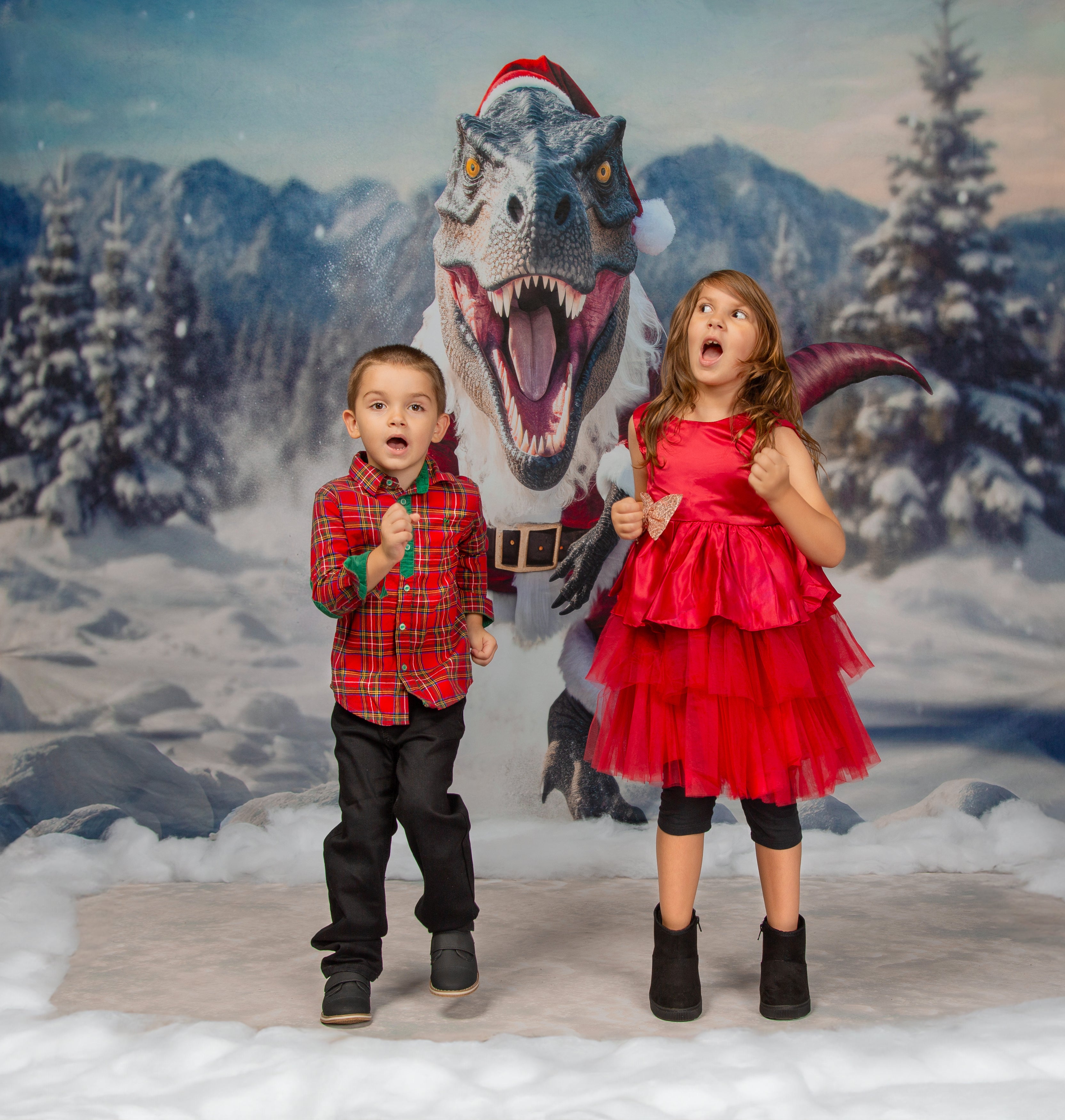 Kate T-Rex avec des vêtements de Père Noël Toile de fond conçue par Mini MakeBelieve